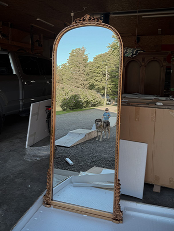 Gold-framed salon mirror during the Hometown Beauty fit-out