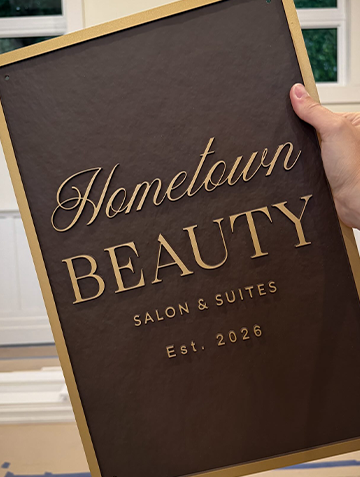 Hometown Beauty Salon & Suites brand sign